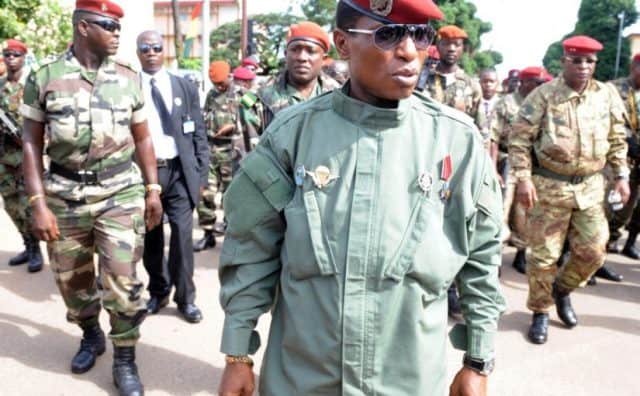 Military leaders and officials attending the event in formal attire.