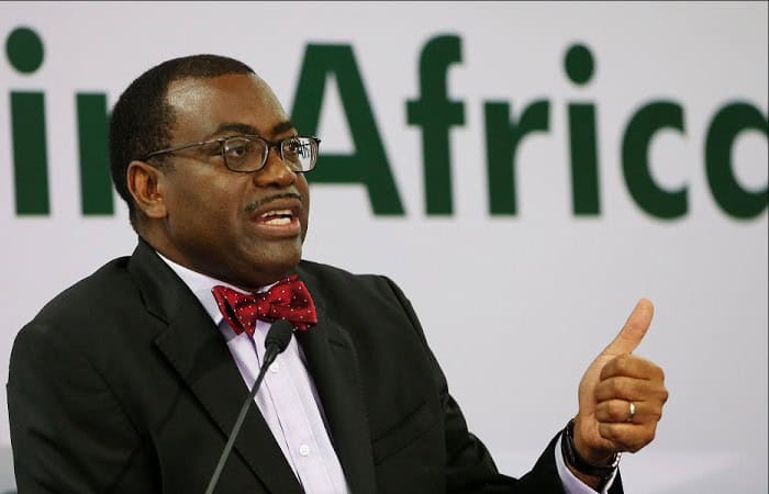 Banker speaking at conference about financial challenges in Africa.