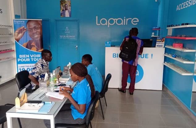 Eyecare clinic in Ivory Coast with staff assisting customers and providing eye health services.