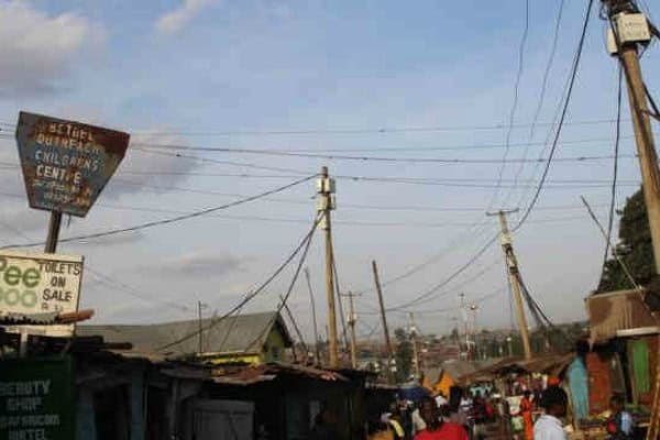 Urban African startup environment with local businesses and infrastructure.