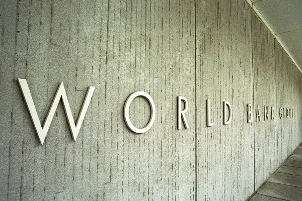 World Bank building with "WORLD BANK" sign in Sudan, symbolizing economic resilience.