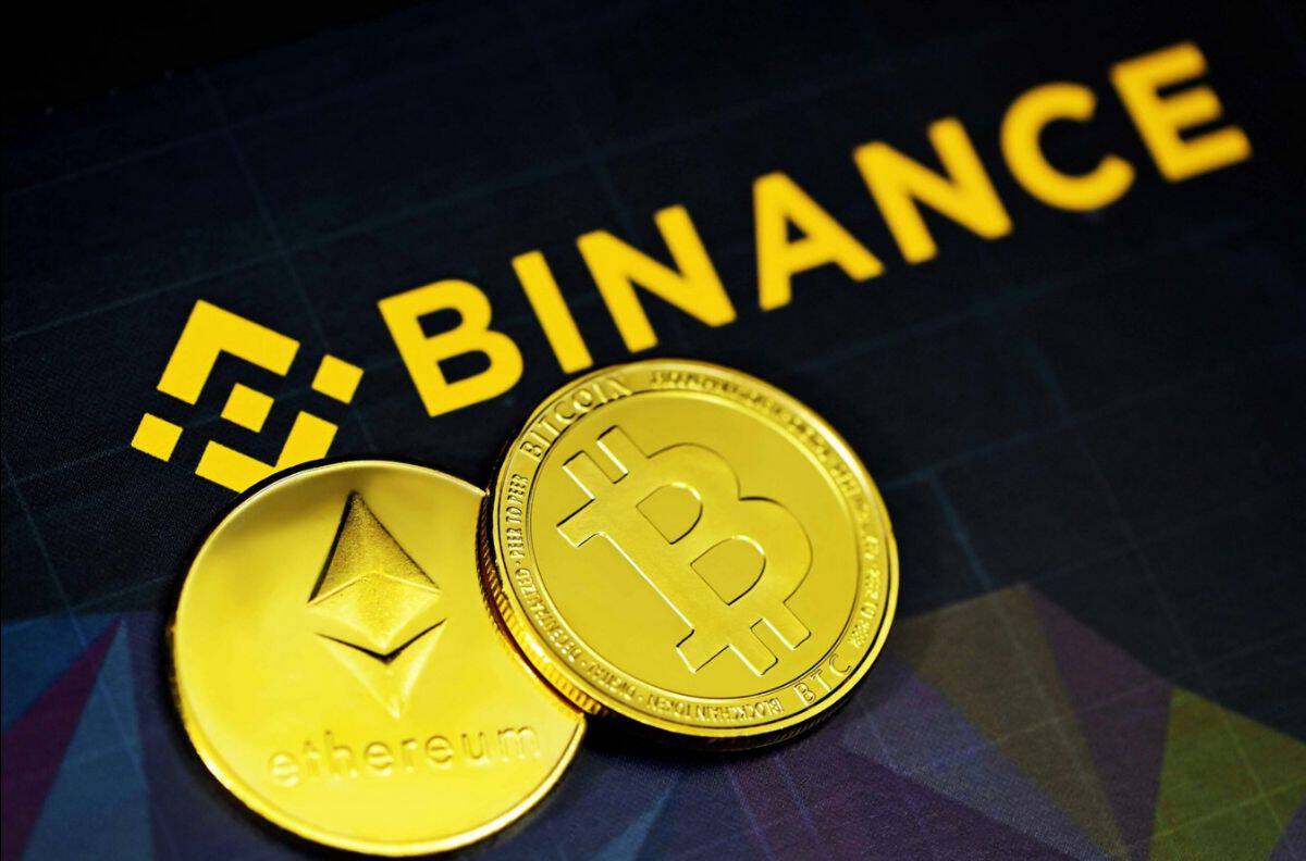 Cryptocurrency coins including Bitcoin and Ethereum on a digital screen.