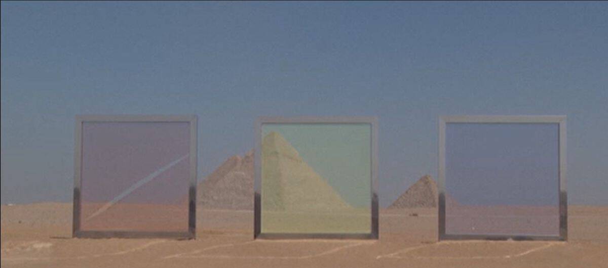 Modern art installations with glass frames at Giza Pyramids, transforming the historic site into an.