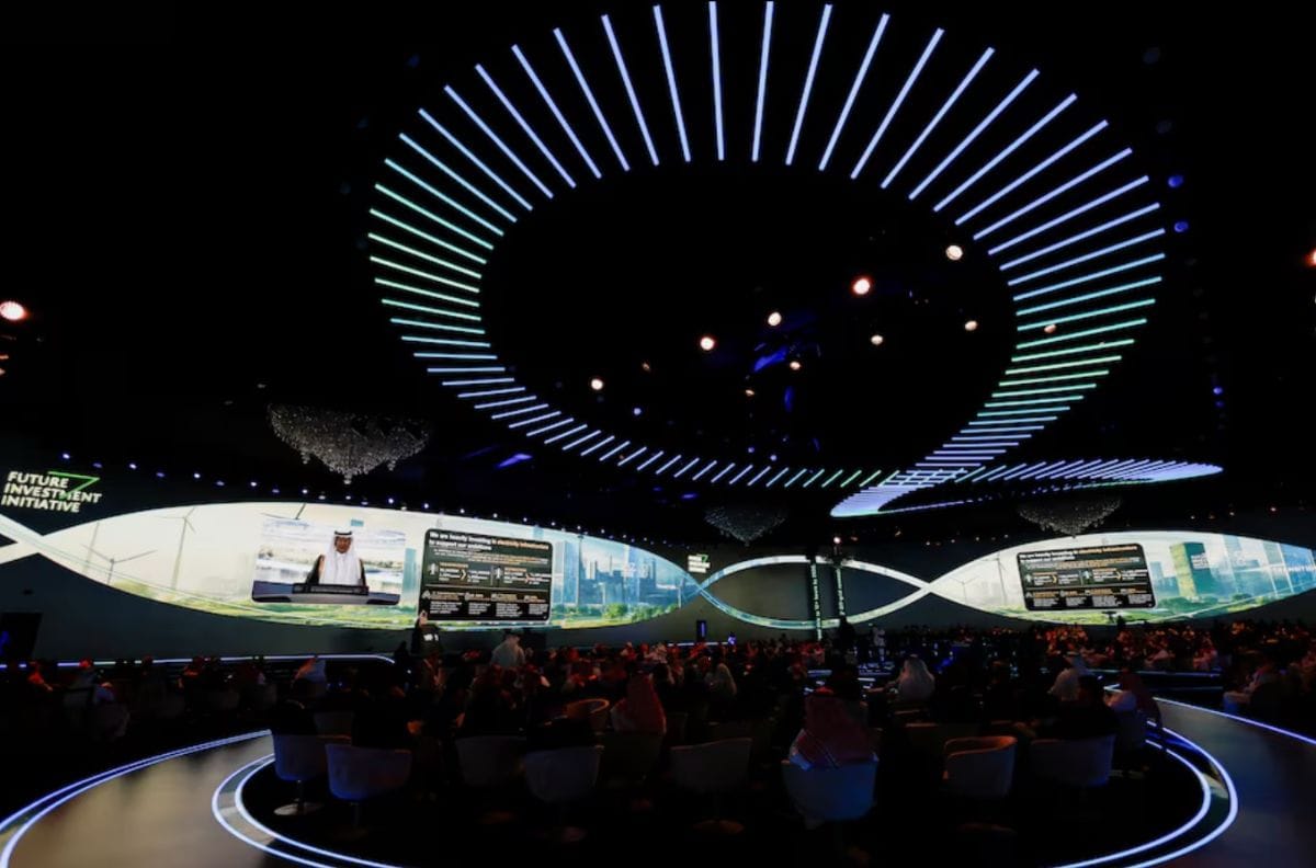 Modern circular LED lighting design at a technology conference.