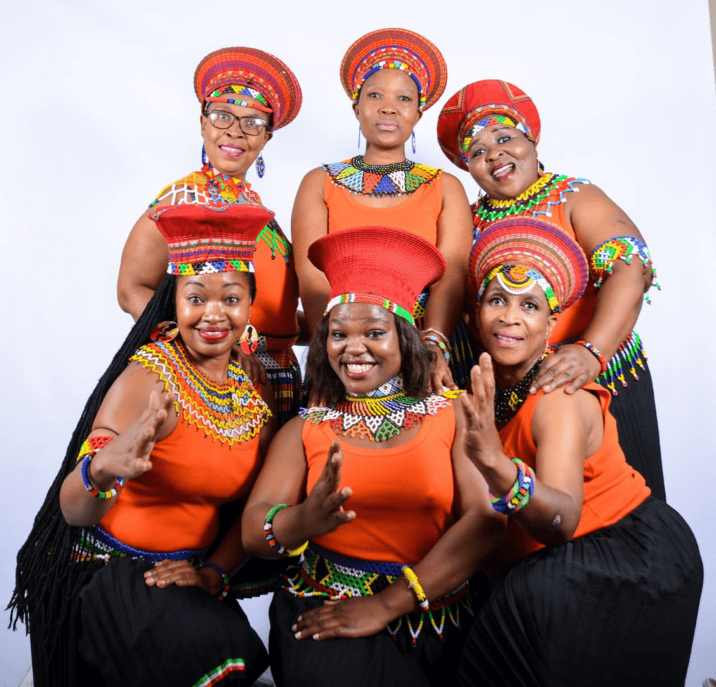 “Christmas All Around The World” Unites Cultures Through Song With Afrika Mamas And Debé Gunn