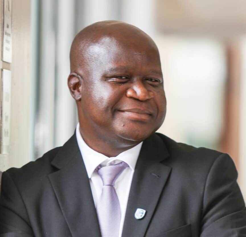 Business leader at Limpopo SMME awards recognizing economic transformation.