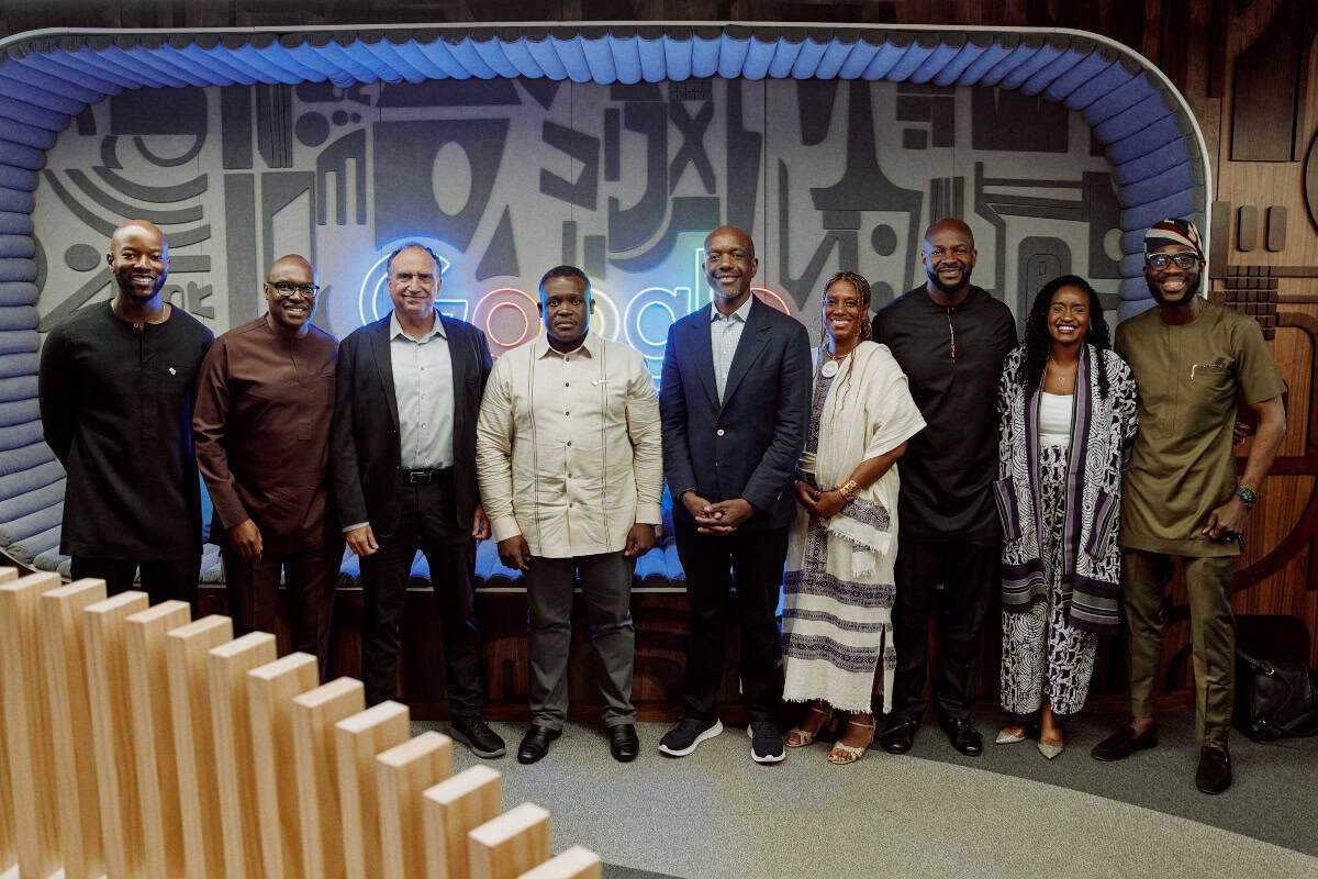 Google Deepens AI Commitment In Africa With New Community Center, Research Support, And Talent Programs 3 Group of diverse professionals at Africa AI community event.
