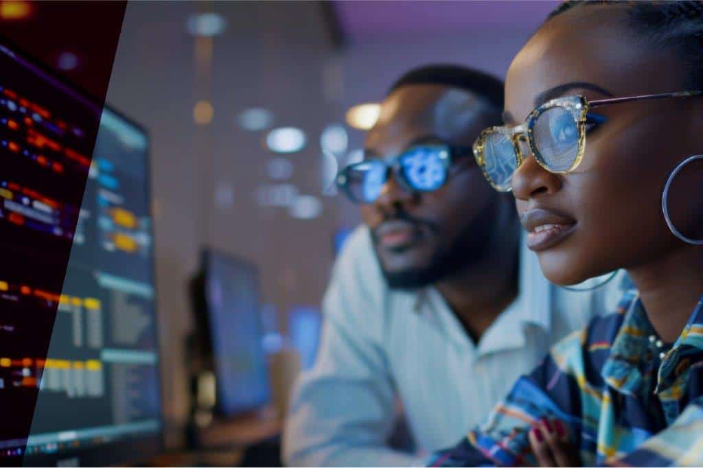 South African manufacturing professionals using digital tools and data analytics.