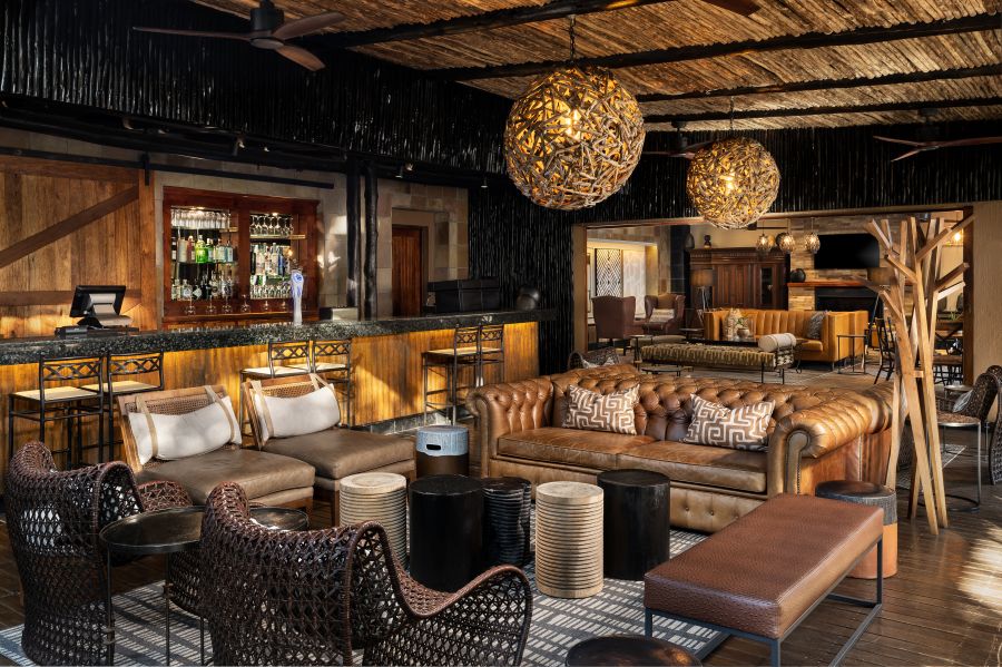 Offsite business meeting in a stylish African lodge setting.