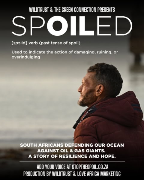 South African man watching ocean pollution and illegal oil drilling.
