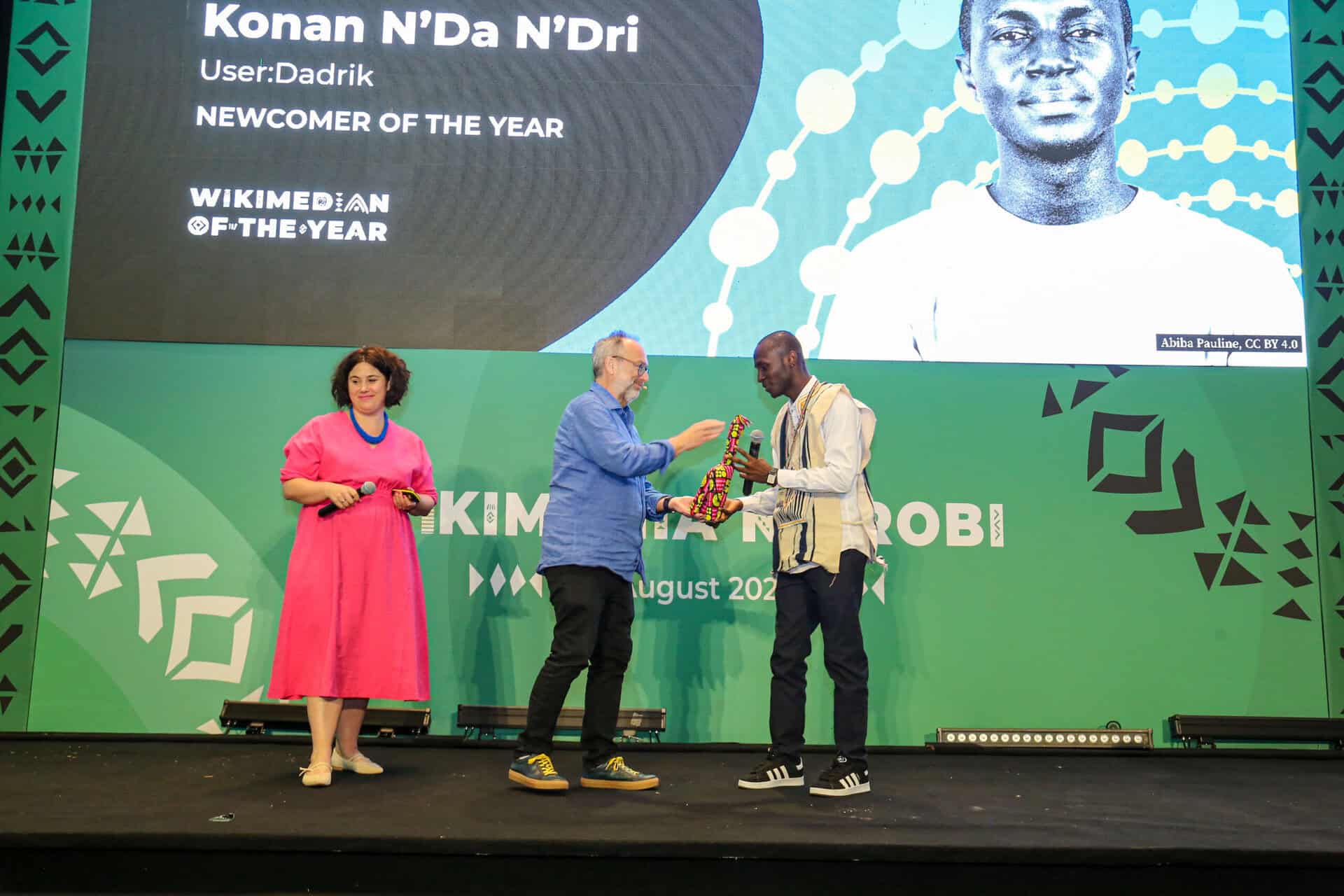 Jimmy Wales awards volunteers at Wikimania 2025 Kenya event.