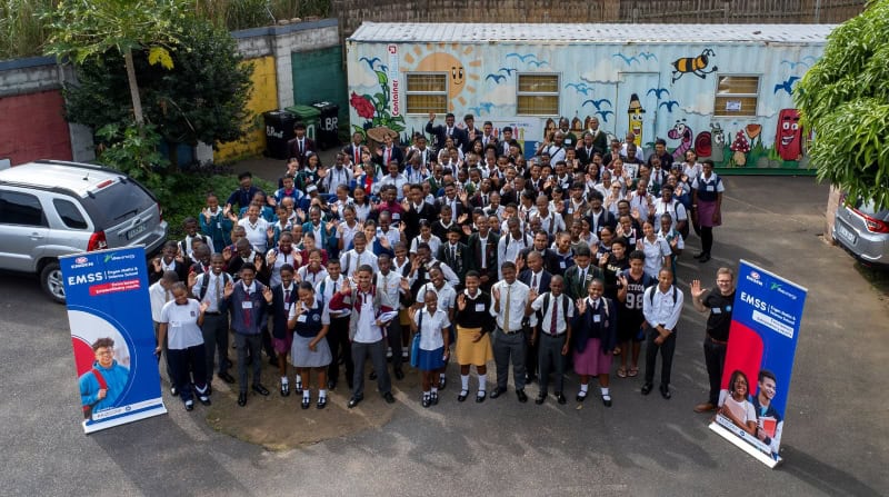 Students gathered outdoors for the new blended learning platform launch.
