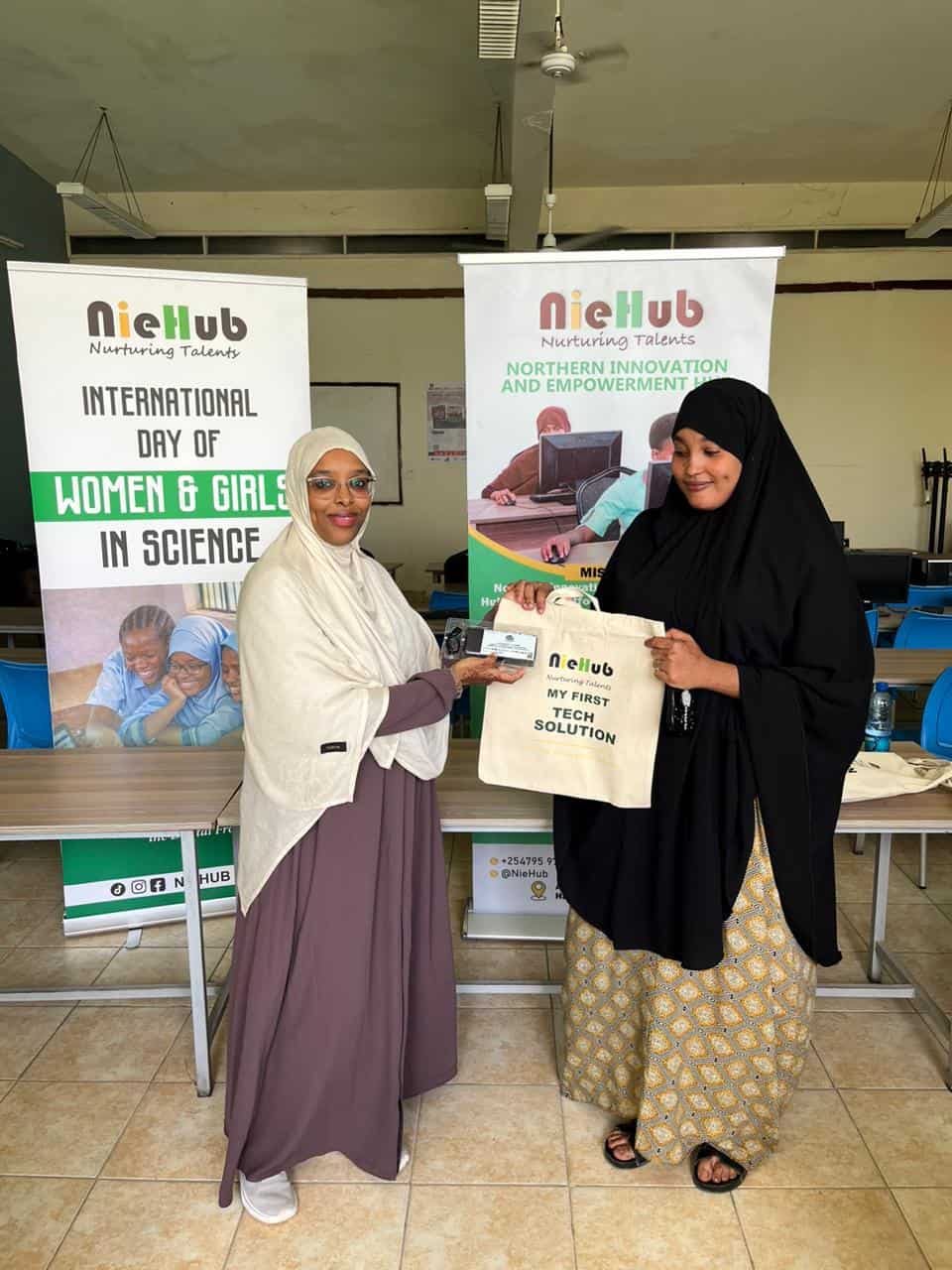 My First Tech Solution Hackathon For Girls In Garissa 2 Women and girls in Garissa participating in tech event.