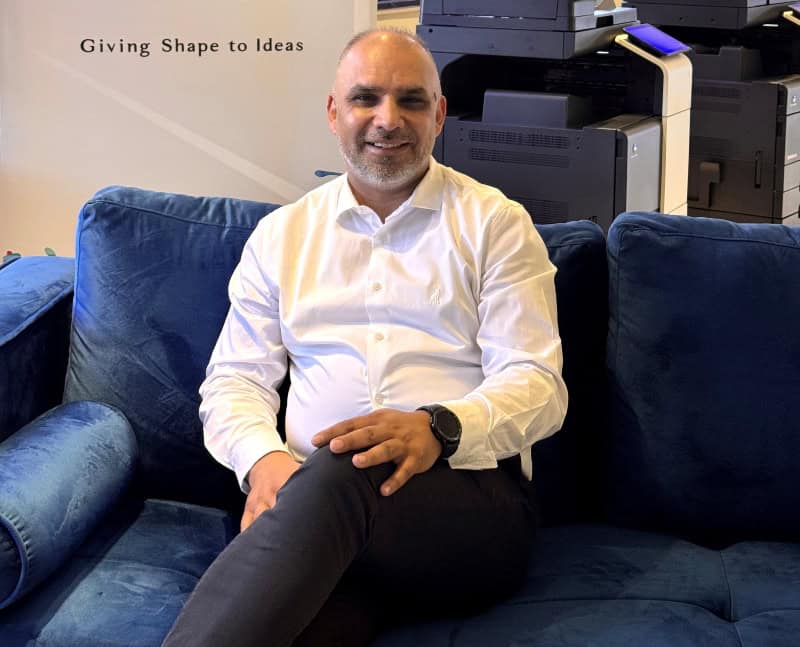 A Legal Imperative For Strengthening Data Governance And Protecting Personal Information 1 Professional man in office setting discussing data governance and personal information protection.