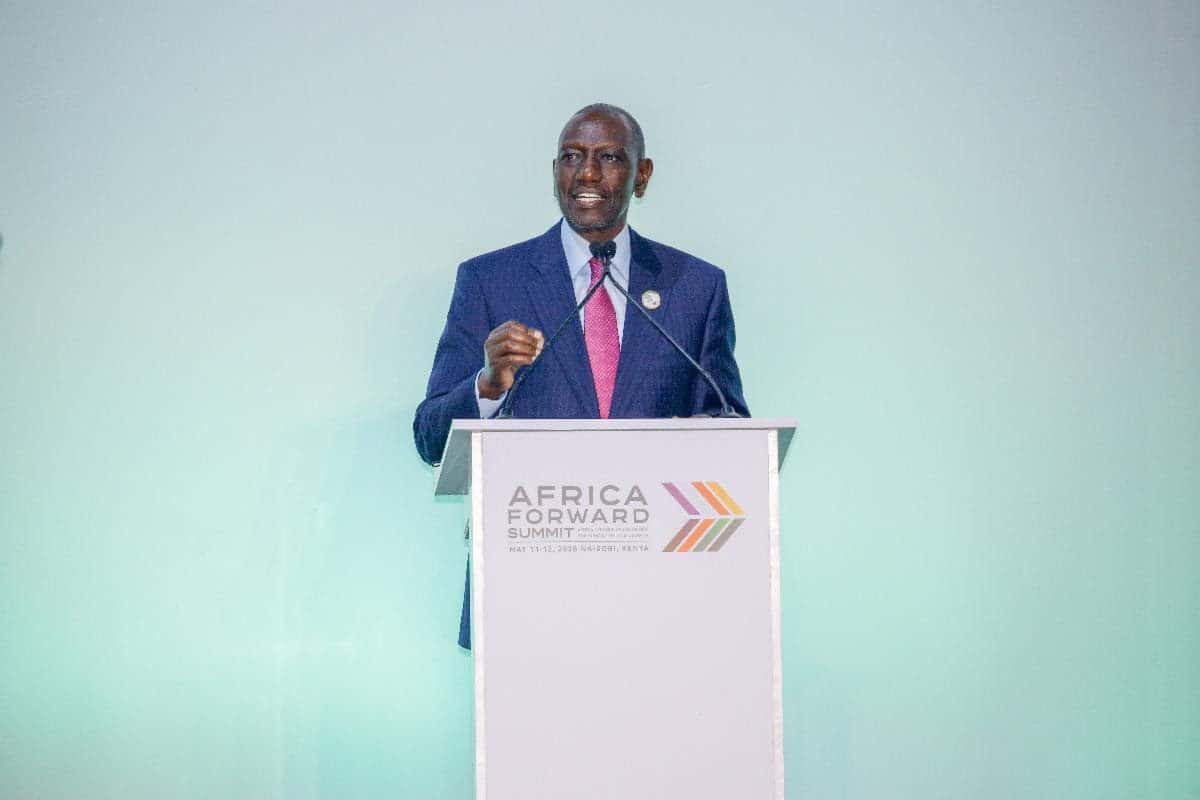 African man speaking at the Africa Forward Summit, delivering a speech.